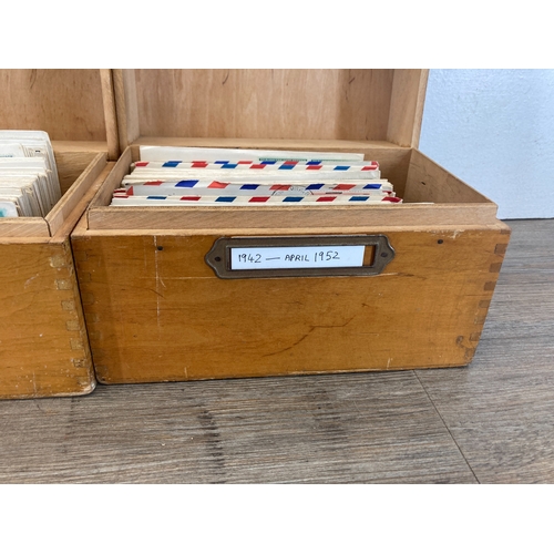 Three wooden boxes containing 1940s, 1950s and 1960s first day covers