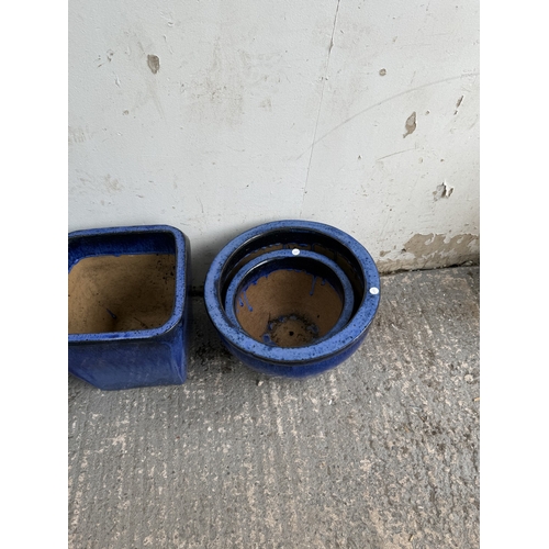 26 - Eight blue glazed garden planters - largest approx. 40cm diameter