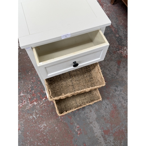 6 - A modern white painted bedside cabinet with two wicker basket drawers - approx. 70cm high x 38cm wid... 