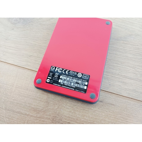 A collection of external computer memory storage devices to include ...