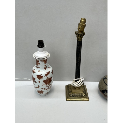 Four table lamps, one Louis Mulcahy handmade studio pottery, one ...