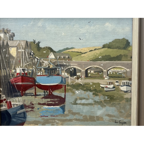 A 20th century Ian Cooper oil on board depicting a West Country harbour ...