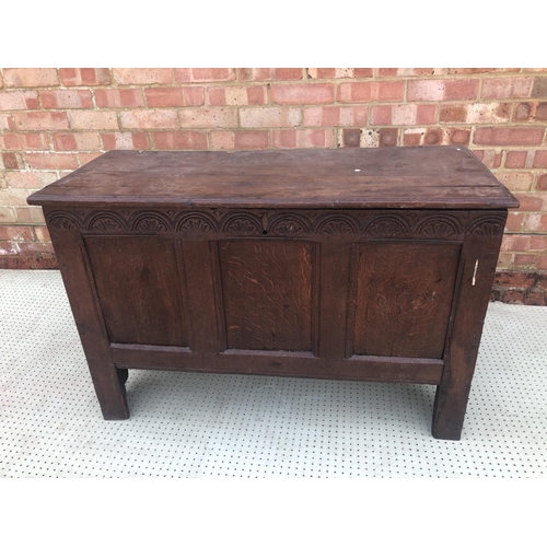 11 - A period oak three panel coffer 106cm x 43cm x 86cm