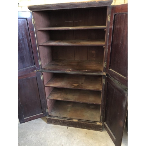 111 - A Stained pine larder cupboard fitted with shelves 86cm x 174cm x 50cm