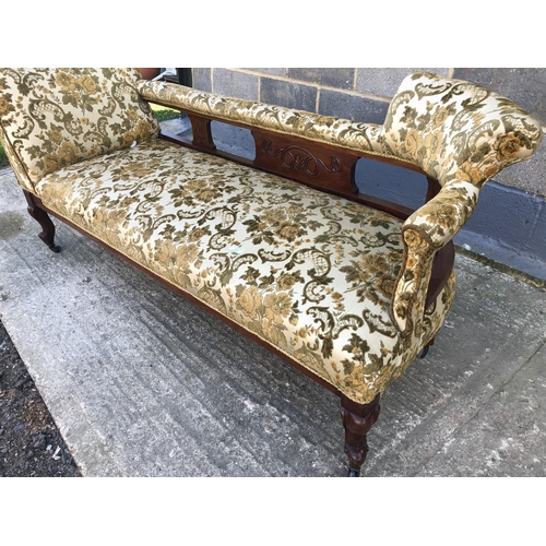 133 - A Edwardian 'Double ended' Chaise lounge upholstered in a gold fabric 177cm x 64cm x 72cm