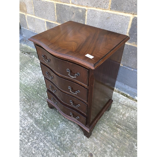 136 - A Small reproduction mahogany serpentine chest of four drawers 50cm x 39cm x 72cm