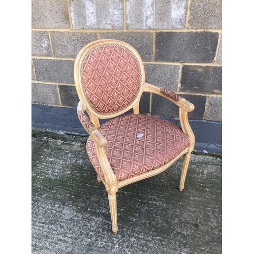 138 - A modern French style armchair with a pink patterned upholstery