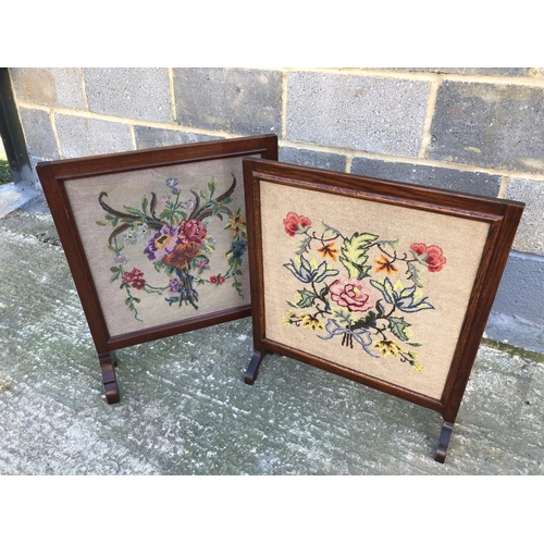 139 - Two tapestry fire screens. One in an oak frame, the second in a mahogany frame with a glazed front