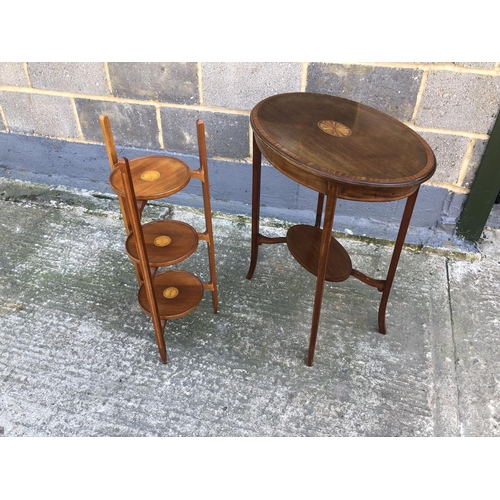 141 - A mahogany occasional table with inlaid top, together with an inlaid three tier cake stand