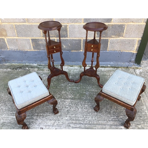 142 - A pair of mahogany two drawer pedestals, together with a pair of oak stools, blue cushions raised on... 