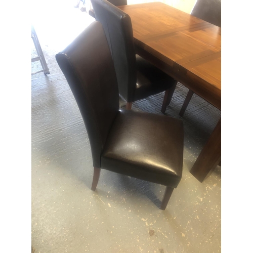 161 - An extending modern dining table and six leather dining chairs 180cm x 90cm x78cm (full extension)