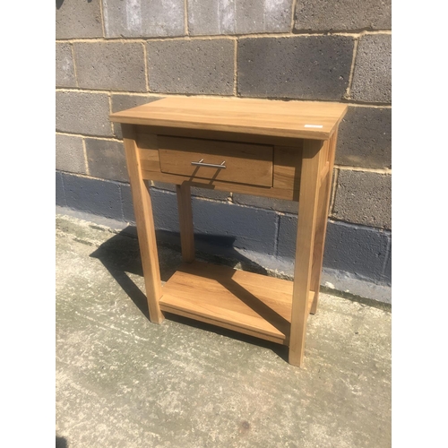 163 - A light oak hall table with a single drawer 60cm x 32cm x 76cm