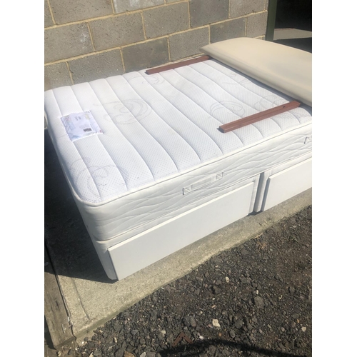 176 - A 4ft double divan bed with mattress and 4 drawer base