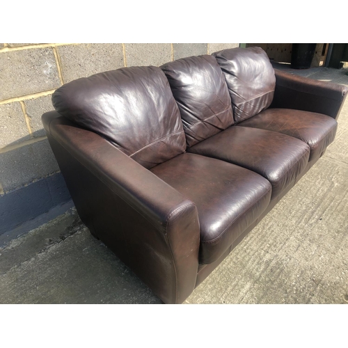 180 - A modern brown leather three seater sofa 200cm x 80cm x 75cm