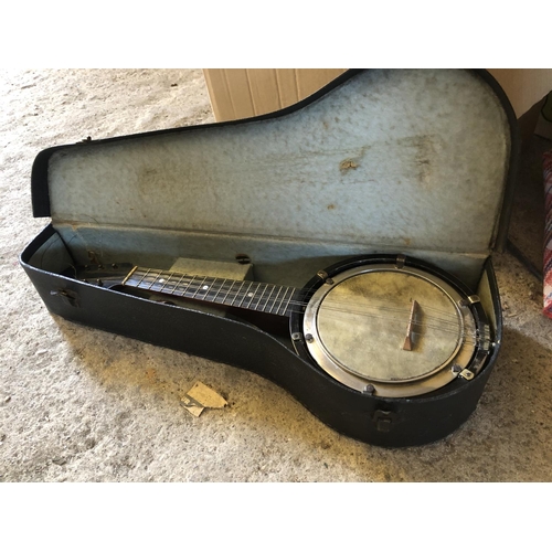 229 - Cased banjo 55 cms long