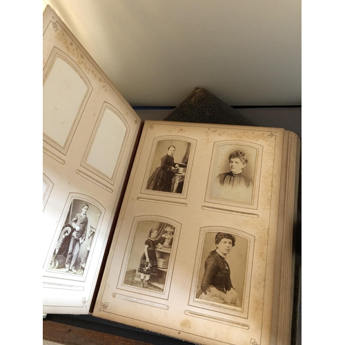 275 - Two Victorian photo albums with some contents