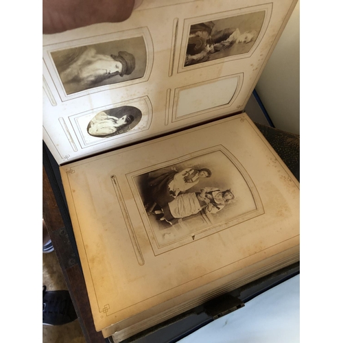 275 - Two Victorian photo albums with some contents