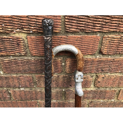 407 - Carved ebony silver topped walking stick and shooting stick