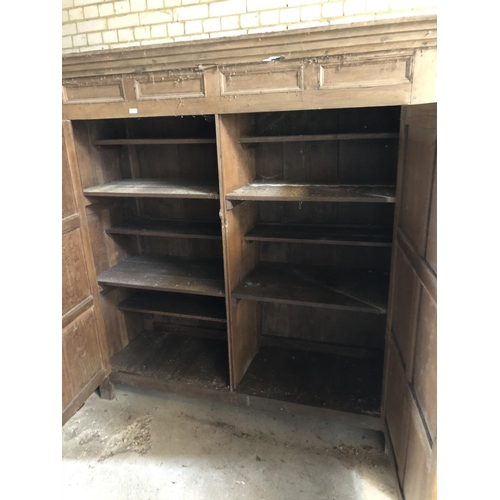 50 - A large continental oak press / larder cupboard 180cm x 60cm x 200cm