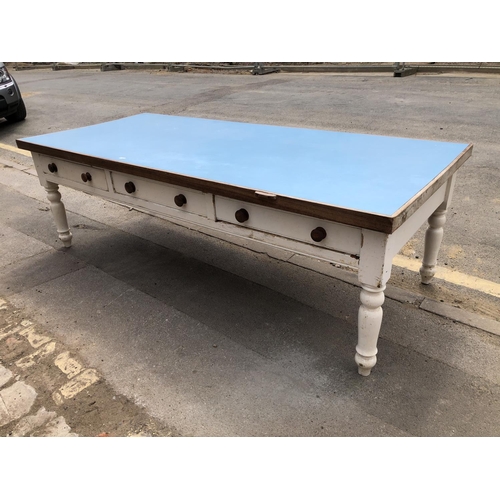 54 - A huge painted pine country house kitchen table, Formica top, 3 drawers to each side on solid pine l... 