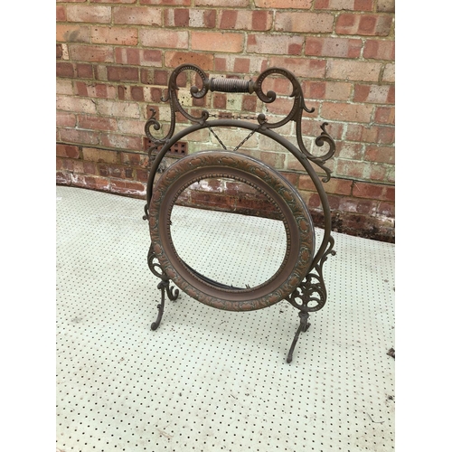 66 - A Brass fire screen frame 72cm high