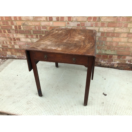 67 - A Georgian mahogany drop leaf table, single drawer on straight legs. 63cm x 84cm x74cm