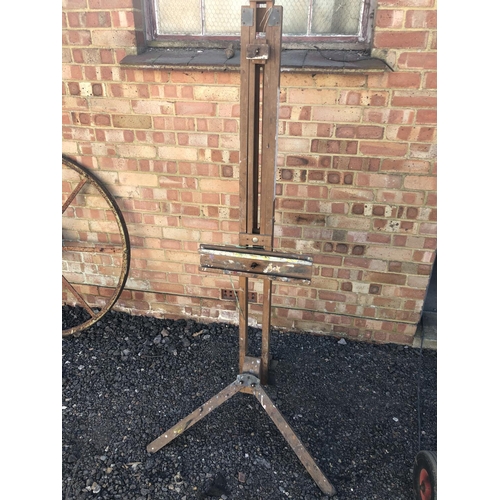 73 - A 20th century wooden folding artists easel 177cm high