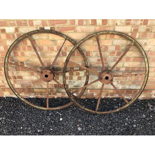 74 - A pair of iron cart wheels 112cm diameter