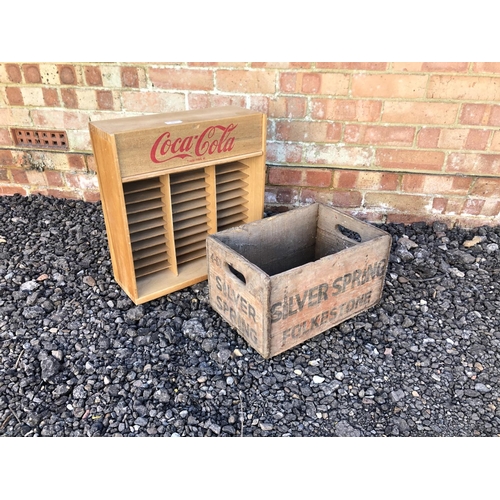 77 - A Vintage drinks crate 'Silver Spring Folkestone' Together with a Coca cola rack