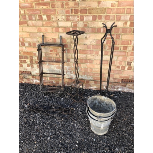 78 - A cast Iron fire grate, two garden obelisks & three galvanised buckets