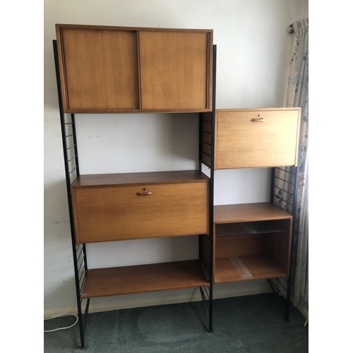 83 - A two bay 'Ladderax' Home office system comprising of 2 bureau sections, 2 cupboards and one shelf