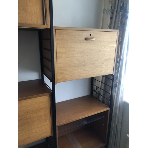 83 - A two bay 'Ladderax' Home office system comprising of 2 bureau sections, 2 cupboards and one shelf