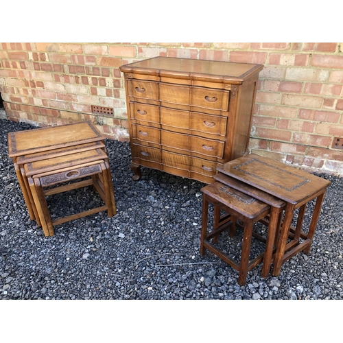 86 - A small Indonesian Carved Chest of four drawers, together with two matching nests of tables