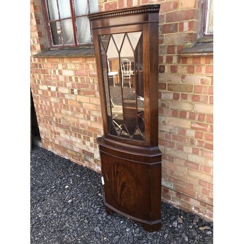 90 - A reproduction mahogany corner cabinet 180cm x 65 cm