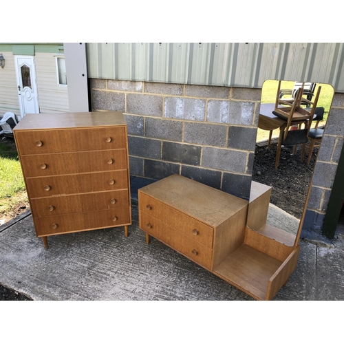13 - A Light oak G plan stlye bedroom pair, comprising of a chest of five drawers and a two drawer dressi... 