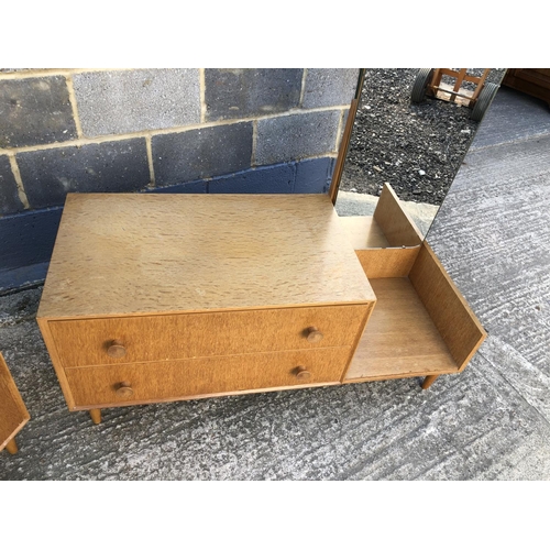 13 - A Light oak G plan stlye bedroom pair, comprising of a chest of five drawers and a two drawer dressi... 