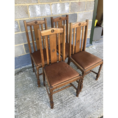 20 - A set of four 1920's Oak dining chairs with barley twist legs