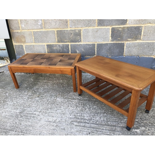 24 - A teak coffee table with tile top, together with a teak trolley