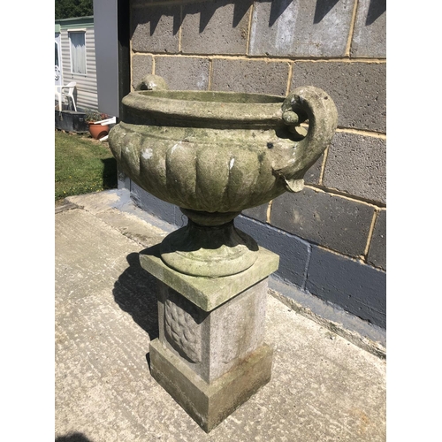 48 - A concrete garden urn on square plinth 90cm h 60cm wide