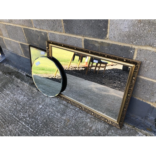 6 - Three mirrors, one large gold gilt framed mirror, together with a frameless bevelled mirror and one ... 