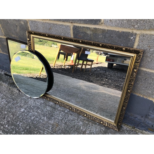 6 - Three mirrors, one large gold gilt framed mirror, together with a frameless bevelled mirror and one ... 