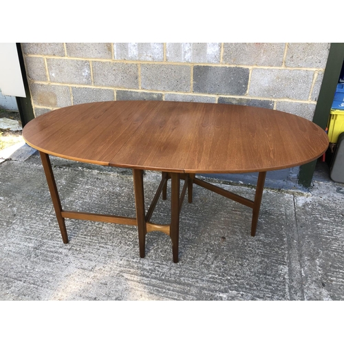 9 - A 1970's Teak dropleaf table 98 x 167 x 75h