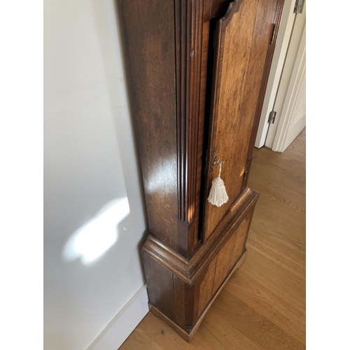 55 - An oak cased eight day longcase clock by Adams of Middlewitch