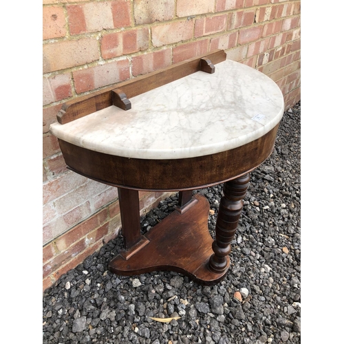 56 - A Demi lune Victorian Mahogany washstand with marble top 76x38x77