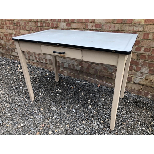 10 - An enamel top kitchen table on painted base 106x61x74