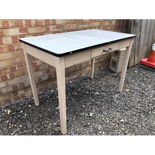 10 - An enamel top kitchen table on painted base 106x61x74