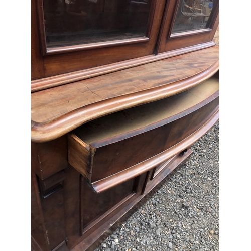 104 - A Victorian mahogany bookcase cupboard 124x52x210