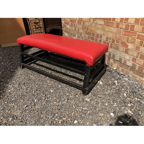 15 - A red vinyl upholstered pommel horse top, converted to seating 128x50x50