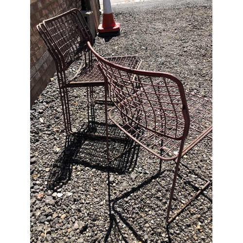 159 - A set of four mid century red stacking basket chairs