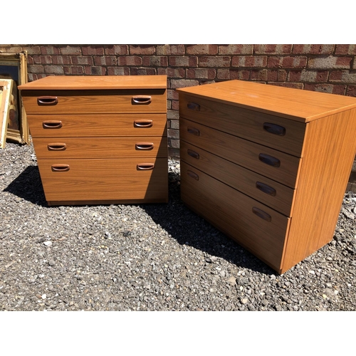 162 - A pair of teak effect chests of four drawers